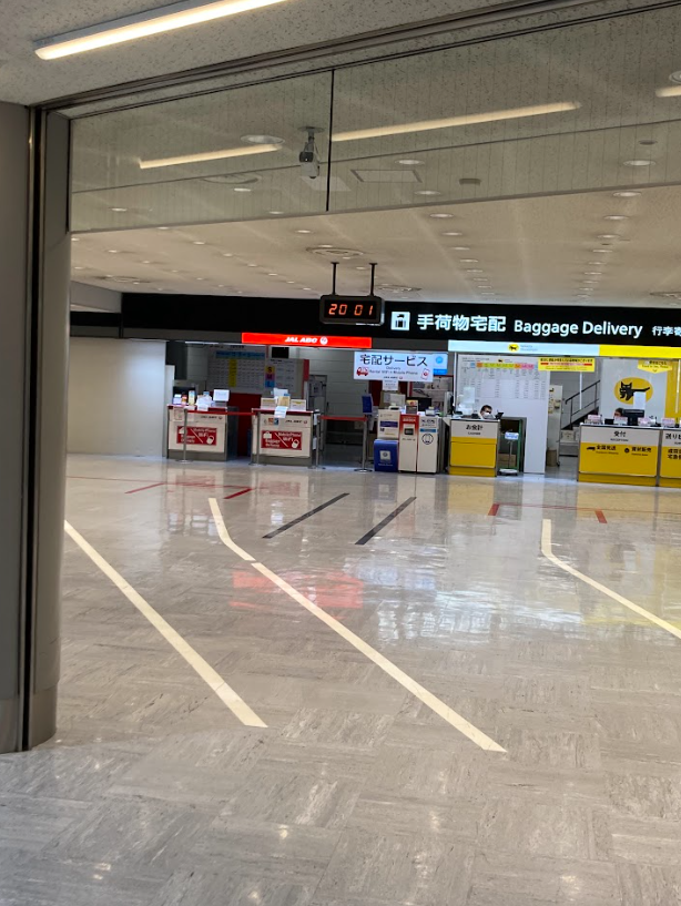 Narita Terminal1 North wing baggage delivery counter with yamato and JAL ABC visible